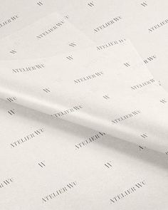 three sheets of white paper on top of each other with the word william written across them