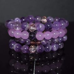 A unique two color of gemstone and jade beaded stretch bracelets. Multiple strands purple beaded women's bracelets with 10mm Amethyst crystal beads. Amethyst, a stone traditionally worn to guard against drunkenness and to instill a sober mind. Carnelian is an agate class of chalcedony that is a stone of creativity, individuality, and courage. Like all agates, it has protection energies. {"@context":"https://schema.org/","@type":"Product","name":"Amethyst And Purple Carnelian Beaded Multi Strands Purple Crystal Bracelet, Amethyst Crystal Bracelet, Women's Bra, Purple Beaded Bracelets, Beaded Braclets, Crystal Bead Jewelry, Purple Beaded, Purple Jade, Purple Bracelet