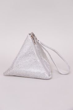 The perfect evening bag when you're feeling glamorous! The Rhinestone Triangle Bag is adorned in all-over rhinestones and features a chic ring handle bag design. Other details include a removable chain, snap button front closure, and silk interior. 8" x 6" x 6" Holds smaller items: lipstick, i.d., money, and keys. ﻿Compatible with small mobile phones. Colors may vary with different viewing devices. Silver Bling Bags For Night Out, Silver Evening Bag With Bling For Night Out, Chic Silver Crystal Evening Bag, Silver Rhinestone Pouch Bag, Chic Silver Bags With Rhinestones, Glamorous Bags With Silver-tone Hardware For Events, Chic Silver Pouch Evening Bag, Glamorous Event Bags With Silver-tone Hardware, Silver Crystal Clutch Bag