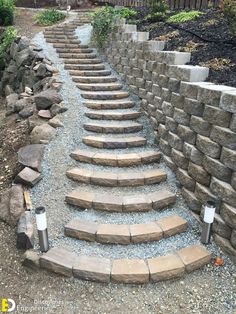 stone steps leading up to the top of a hill