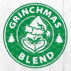 the grinchmas blend logo on a white wooden background with green and white lettering