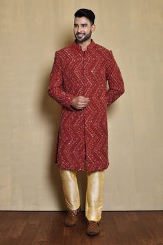 Red full sleeve sherwani with mirror, thread, cutdana, sequin embroidery in chevron pattern. Paired with gold pant. - Aza Fashions Red Long Sleeve Sherwani For Formal Occasions, Formal Red Long Sleeve Sherwani, Red Formal Long-sleeve Sherwani, Red Long Sleeve Formal Sherwani, Red Sherwani For Festive Occasions, Red Long Sleeve Sherwani With Resham Embroidery, Red Sherwani With Chikankari Embroidery Long Sleeve, Red Bandhgala For Eid, Red Chikankari Embroidery Kurta For Formal Occasion