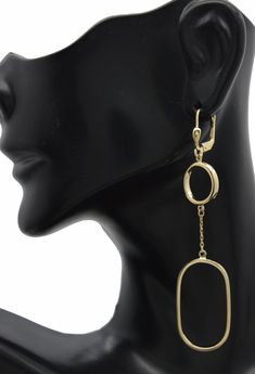 Our Real 14K Solid Yellow Gold Round & Paperclip Inspired Dangle Drop Earrings are the perfect way to make a timeless statement! Handcrafted from 14K yellow gold, these unique earrings will make you the envy of your friends. With each earring weighing 2.9 gr, you can make a bold yet delicate fashion statement. Make a statement with these dangle drop earrings today! Specifications: Metal: Real 14K Yellow Gold (Stamped, 14K) Condition: Brand New Polished: Shiny Weight: 2.9 grams Height: 2.85 inch Yellow Gold Oval Metal Earrings, Yellow Gold Clip-on Dangle Jewelry, Yellow Gold Clip-on Dangle Earrings, Yellow Gold Clip-on Drop Earrings, Clip-on Dangle Earrings In Yellow Gold, Elegant Stamped 14k Gold Dangle Earrings, Formal Dangle Hoop Earrings Fine Jewelry, Formal Clip-on Dangle Earrings, 14k Gold Dangle Hoop Earrings For Formal Events