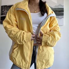 Vintage 2000s 2k Columbia yellow white bomber windbreaker oversized utility streetwear preppy bomber style windbreaker by columbia in very good vintage condition will best fit a size medium to large fits oversized White Y2k Outerwear For Spring, White Y2k Spring Outerwear, White Y2k Outerwear For Streetwear, White Y2k Streetwear Outerwear, White Y2k Style Streetwear Outerwear, Oversized White Outerwear For Outdoor Activities, Yellow Hooded Windbreaker For Streetwear, Hooded Yellow Windbreaker For Streetwear, Yellow Long Sleeve Windbreaker For Streetwear