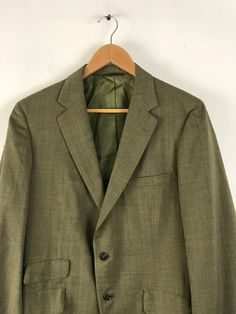 "-Description- >olive green plaid sport coat/blazer >two button front >two buttons on the cuffs >three flap close and one open pocket on the front >double vent in the back >partially lined >size 38 >so preppy! >condition: excellent >color(s): olive green >fabric(s): wool blend >brand: zachary roberts >care: dry clean -Measurements- >size: 38 ✩ all measurements are taken with the item laying flat & some sizes are estimates so please check measurements Green Long Sleeve Sport Coat With Button Closure, Green Outerwear With Single Button And Suit Collar, Green Single Button Outerwear With Suit Collar, Green Fall Sport Coat With Buttons, Green Fall Sport Coat, Green Fall Sport Coat With Button Closure, Green Sport Coat With Button Closure For Fall, Green Sport Coat For Fall, Classic Green Outerwear With Welt Pockets