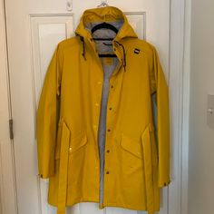 Reposhing This Item I Purchased From @Mwesthuis. Loved It, But Ready To Rotate For Something New. Questions? Leave A Comment Below! Yellow Raincoat With Pockets For Fall, Hooded Yellow Raincoat For Fall, Yellow Hooded Raincoat For Fall, Yellow Raincoat For Fall Outdoor Use, Yellow Raincoat For Outdoor Use In Fall, Yellow Outerwear For Rainy Fall Weather, Yellow Spring Outerwear For Rainy Weather, Casual Yellow Raincoat For Fall, Long Sleeve Yellow Raincoat For Spring