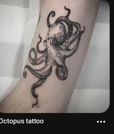 an octopus tattoo on the arm