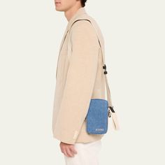 Jacquemus "Le Cuerda" crossbody bag in cotton denim with leather accents Logo hardware on the front Adjustable shoulder strap Zip closure with wrist strap Exterior, one back slip pocket Interior, one slip pocket Cotton lining Approx. 7.1"H x 4.3"W Imported Denim Crossbody Shoulder Bag For Travel, Denim Blue Shoulder Bag For Travel, Denim Blue Shoulder Bag With Pockets For On-the-go, Casual Everyday Pouch Camera Bag, Denim Blue Shoulder Bag With Pockets For Travel, Denim Shoulder Bag With Adjustable Strap For Travel, Travel Denim Shoulder Bag With Adjustable Strap, Denim Blue Crossbody Shoulder Bag For Travel, Casual Crossbody Camera Bag With Zipper Pocket