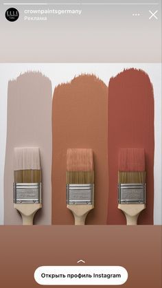 three paintbrushes with different shades of pink, orange, and brown on them