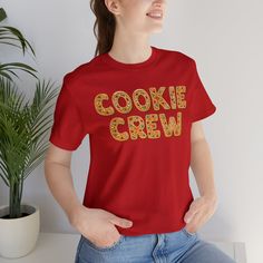 Whether you're an expert cookie decorator or just love the scent of freshly baked treats wafting through the air, this T-shirt is your badge of honor. Join the "Cookie Crew" and make this holiday season a sweet and stylish affair with a T-shirt that celebrates the magic of baking. Embrace your love for cookies and wear it proudly - because when it comes to spreading cheer, the "Cookie Crew" T-shirt is the perfect recipe for style and comfort. Cookie Brand Shirt, Baked Treats, No Bake Treats, Crew Shirt, Freshly Baked, Perfect Food, Cookies Et Biscuits, Biscuits, Holiday Season