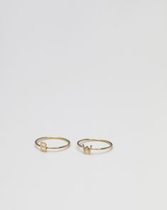 Dainty 14K Initial Letter Ring Simple, minimalist everyday Alphabet Initial Ring Each initial measures approx. 4.8mm Available in 14K Yellow Gold or 14K White Gold * Leave us your initials and placement in the comment box at checkout. PLEASE READ BELOW BEFORE PURCHASE --------------------------------------- SIZE: US5, US6, US7 Letter: A-Z or an heart charm --------------------------------------- SHIPPING UPGRADES You can find shipping upgrades options in the drop bar menu when you check out. + W Initial Rings, Gold Stacking Ring, Letter Ring, Name Rings, Gold Letter, Rings Gold, Gold Ring Stack, Initial Ring, Solid Gold Rings