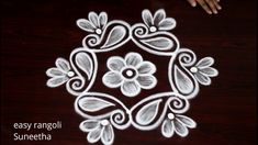 an easy rangdi design with flowers and leaves