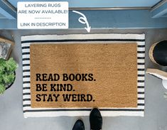 a door mat that says read books be kind stay weird on the floor next to shoes