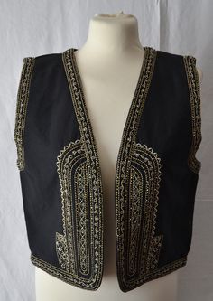 Zara Embroidered black waistcoat Sizes available: S Composition: OUTER SHELL MAIN FABRIC 100% Cotton Any question, please feel free to ask me. Thank you for visiting my shop! Elegant Embroidered Festive Vest, Embroidered Festival Vest, Embroidered Sleeveless Vest For Festival, Black Floral Embroidery Sleeveless Vest, Elegant Embroidered Sleeveless Vest, Bohemian Black Embroidered Vest, Traditional Black Sleeveless Vest, Black Folk Style Festival Vest, Traditional Black Vest For Festival