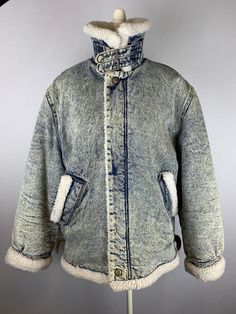 "Vintage 80's Sone Washed Denim Sherpa Jacket  Label size Medium  Fits men's size medium Made In Italy by Forenza 100% cotton  Machine washable  Zipper front  Adjustable waist straps Pockets  Neck/Collar straps Fully Lined Great condition.  25-1/2\" across the chest  20-1/2\" shoulder to shoulder seam  25\" shoulder seam to cuff  30-1/2\" from collar fold to hem" Fall Washed Blue Pre-washed Outerwear, Medium Wash Denim Jacket For Winter Outdoor, Winter Washed Blue Outerwear For Streetwear, Acid Wash Cotton Retro Outerwear, Retro Acid Wash Cotton Outerwear, Pre-washed Cotton Denim Jacket For Winter, Retro Washed Denim Blue Outerwear, Washed Blue Cotton Denim Jacket For Winter, Rugged Denim Jacket With Pockets For Winter