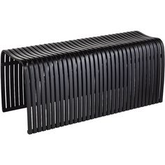 a large black radiator sitting on top of a white floor