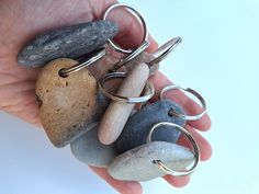 a person holding some rocks in their hand