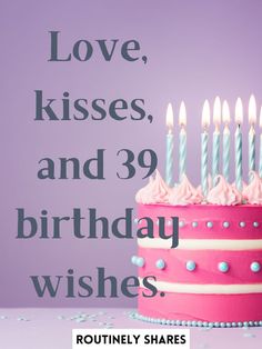 a pink birthday cake with candles on it and the words love, kisses, and 39 birthday wishes