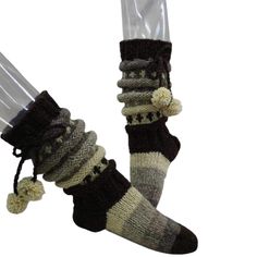 Traditionally hand-knitted woolen socks are designed to keep your feet warm and protected on cold winter days. You can wear them as thick house socks, slippers or wear them with your hiking boots. Available in all adult sizes from extra small to extra large. Material: 100% natural sheep wool yarn! Natural sheep colors. The wool is not dyed. Maintenance instructions: Gentle hand wash in cool water with a special detergent for wool! Lay flat to dry, do not tumble dry. As a raw yarn product, it wil Wooly Socks, Wool Boot Socks, Fluffy Wool Socks, Hand Knitted One-size Winter Socks, Womens Wool Socks, Thick Wool Socks, House Socks, Woolen Socks, Knit Wool Socks