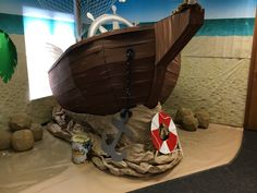 there is a fake boat on display in the room