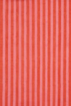 an orange and pink striped fabric with vertical stripes