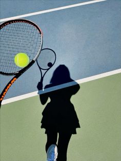 the shadow of a woman holding a tennis racket and ball on a tennis court