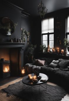 a living room filled with furniture and candles