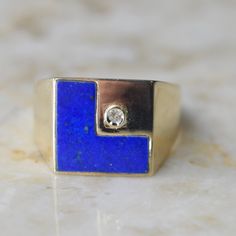 "Vintage 14k gold signet ring with an \"L\" shaped lapis lazuli stone and a small diamond.  Era: 1970s-80s Markings: 14k 585 Materials: 14k gold, lapis lazuli, diamond Ring Size: 9 3/4 (comes with one free resizing by our jeweler) Condition: Good vintage condition with some wear from age  Shipping is free in the United States Follow on Instagram @LUXXORVintage" 14k Gold Signet Ring, L Monogram, Silver Money Clip, Cultured Pearl Ring, Portrait Necklace, Hudson Ny, Lapis Lazuli Jewelry, Signet Rings, Gold Signet Ring