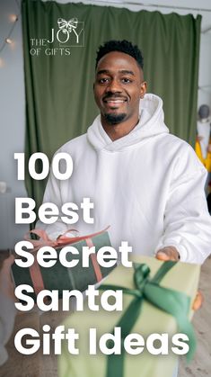 a man holding a present box with the words, 100 best secret santa gift ideas