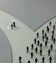 a group of people walking across a snow covered ground with the words god me on it