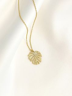 "--NATURE COLLECTION-- This dainty gold monstera leaf necklace is perfect for casual, special occasions or date night. Makes a great gift for Best Friends, Birthdays, Mother's Day, Wedding, Anniversary or any occasion. Choose between 6 beautiful necklace pendants representing the graceful beauty of nature. 1. Tiny Sparkly Bee (12mm x 12mm) 2. Dainty Butterfly (12mm x 10mm) 3. Golden Dandelion (10mm x 16mm) 4. Golden Cactus (9mm x 18mm) 5. Tiny Daisy (11mm x 11mm) 6. Dainty Monstera (16mm x 19mm) Nature-inspired Gold Leaf-shaped Jewelry, Gold Leaf Nature-inspired Jewelry, Gold Leaf-shaped Jewelry Gift, Gold Leaf-shaped Nature-inspired Necklace, Gold Nature-inspired Metal Necklace, Trendy Leaf-shaped Jewelry Gift, Gold Plated Leaf-shaped Jewelry For Gifts, Leaf-shaped Metal Jewelry Gift, Metal Leaf-shaped Jewelry For Gifts