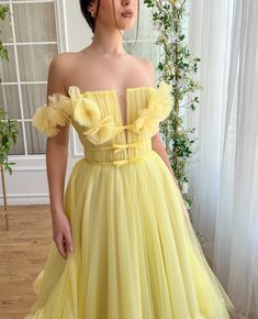 Yellow Magnolia Midi Dress | Teuta Matoshi Yellow Tulle Evening Dress, Spring Off-shoulder Tulle Evening Dress, Yellow Strapless Dress For Garden Party, Off-shoulder Tulle Evening Dress For Spring, Yellow Tulle Dress With Fitted Bodice, Summer Tulle Off-shoulder Evening Dress, Summer Off-shoulder Tulle Evening Dress, Spring Gala Off Shoulder Dress With Sweetheart Neckline, Yellow Tulle Dress For Prom Season