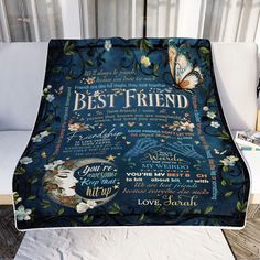 a blanket with the words best friend written on it and a butterfly flying over it