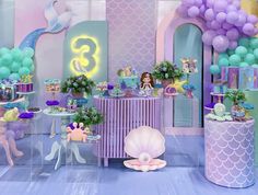 a little mermaid themed birthday party with balloons and decorations