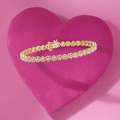 Ross-Simons - .55ct t. w. Diamond Heart Tennis Bracelet Over Sterling. 8". Fall in love with our charming tennis bracelet. Glowing 18kt yellow gold over sterling silver heart-shaped bezel settings hold .55 ct. t. w. round brilliant-cut diamonds in white rhodium, creating the sweetest style! Figure 8 safety. Push-button clasp, diamond heart tennis bracelet. Diamond birthstones are the perfect gift for April birthdays. Heart Tennis Bracelet, April Birthday, Bracelet Diamond, Diamond Birthstone, Figure 8, Sterling Jewelry, Tennis Bracelet Diamond, Sweet Style, Sterling Silver Heart