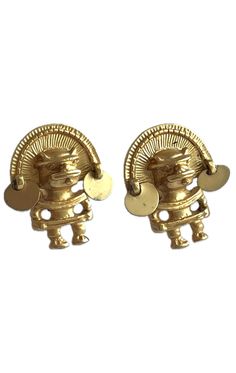 These striking designer INCA clip-on earrings feature a detailed representation of a traditional Inca figure, intricately crafted in gleaming gold brushed metal.  Each earring showcases the figure with a headdress and decorative discs that dangle elegantly, reflecting a connection to ancient Incan culture. Stamped with "Inca" on the back, these earrings are not only a stylish accessory but also a piece of history, perfect for those who appreciate cultural artistry in their jewelry collection. Re Incan Warrior, Incan Culture, Inca Jewelry, Stamped Earrings, Vintage Clip On Earrings, Vintage Eclectic, Vintage Clip, Brushed Metal, Gold Plated Earrings