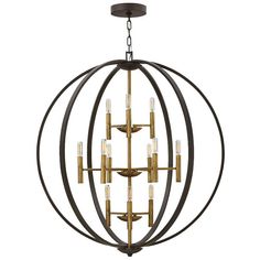 36" wide x 41" high. Canopy is 7" wide. Weighs 31 lbs. Comes with 10-feet of chain and 12-feet of wire. Sloped ceiling adaptable. Uses twelve maximum 60 watt candelabra base E12 light bulbs (not included). Shown with decorative tube bulbs. Euclid modern orb chandelier. From the Hinkley Lighting brand. Open globe orb profile allows the bulbs to be seen. Mixed metals look in Spaninsh Bronze and gold finishes. Steel construction.  The Euclid chandelier offers modern style for foyers, dining rooms and more. From the Hinkley brand, the design features an open orb shape. Inside the orb are three tiers of lights that branch off from a center column. The chandelier comes in a mixed metal finish, with the outer orb globe being in a Spanish Bronze finish, while the tiered lights and columns are in a Foyer Chandelier 2 Story, Foyer Pendant Lighting, Orb Chandelier, House Lighting, Foyer Chandelier, Foyer Lighting, Attic Spaces, Foyer Decorating, Transitional Modern