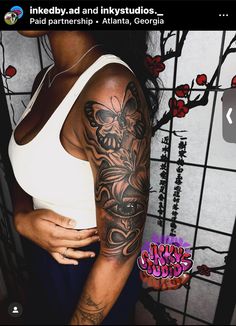 a woman with a tattoo on her arm