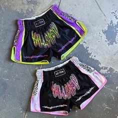 Retro Muay Thai Shorts Hand crafted out of a polyester satin with mesh side panels. 3 inch elastic ribbed waist band. The waist can be worn normally or flipped over the laces traditional Muay Thai style. Waist (inches): XS(26") S(28") M(30") L(32") XL(34") 2XL(36") 3XL(38") 4XL(40") Inseam (inches): S(3.5") M(4") L(4.5") XL(5") 2XL(5.5") 3XL(6) 4XL(6.5) Female model is wearing size small normally wears a size 2 and is 5’7 125 pounds Male model is wearing a size large is 5’8 190 pounds Kill Crew, Wrestling Tights, Stud Outfits, Boxing Clothes, Muay Thai Shorts, Black And White Instagram, Thai Clothes, Mma Shorts, Thai Style