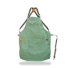 a green apron with two straps hanging from it's back and the front pocket open