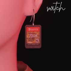 the legend of zelda ear tag is attached to a woman's ear