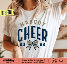 a woman wearing a t - shirt with the words, masoot cheer on it