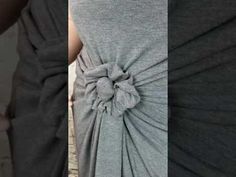 three different images of the same woman's grey dress with a flower on it