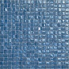 a blue glass tile wall that is very close up