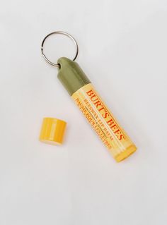 Reusable keychain cap for Burt's Bees lip balm brand. Fits so snug but not so tight it is difficult to take off. Perfect fit! This cap will last you forever due to its durability and with it being a keychain, it is so much easier to keep track of!  *Chapstick not included *Keyring included Boyfriend Keychain Ideas, Burts Bees Chapstick, Burt's Bees Lip Balm, Chapstick Keychain, Lip Balm Keychain, Lip Balm Brands, Burts Bees Lip Balm, Beeswax Lip Balm, Lip Balm Holder