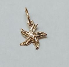 Solid 14k gold pendant. Can Include chains upon request, for affordable prices Diamond Cut finish for a radiant shine. Question? Please don't hesitate to contact me. *Wholesale* Wholesale: The more you buy, cheaper goes the price. 14k Gold Starfish-shaped Jewelry, 14k Gold Starfish Charm Jewelry For Gifts, 14k Gold Jewelry With Starfish Charm For Gift, Gold Starfish Charm Jewelry In 14k Gold, 14k Yellow Gold Starfish Jewelry, Gold Jewelry With Starfish Charm In 14k Gold, 14k Gold Jewelry With Starfish Charm, Gold Sterling Silver Jewelry With Starfish Charm, Starfish Charms Jewelry As Gift