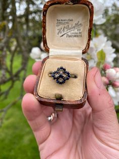 This listing is for a gorgeous vintage 9ct yellow gold sapphire and diamond cluster ring.  ✨DETAILS✨ ✨Hallmarks✨ 9ct gold London 1981, makers mark LW ✨Gemstone✨ Seventeen deep royal blue round cut sapphires set alongside four brilliant cut diamonds. ✨Size✨ UK size O, US size 7.5 (resizing possible if needed) ✨Measurements✨ The face of the ring measures 12x12mm  ✨Weight✨ 3 grams ✨Condition✨ Good vintage condition ✨EXTRA INFORMATION✨ ✨ Unless otherwise stated all vintage/antique boxes pictured are Sapphire Ring Vintage, Vintage Sapphire Ring, Vintage Diamond Ring, Deep Royal Blue, Vintage Sapphire, Vintage Engagement Ring, Engagement Ring Vintage, Vintage Diamond Rings, Antique Boxes