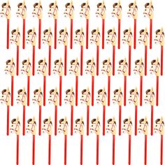 many red toothpicks with faces on them are lined up in the same pattern