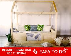 a bed made out of wooden pallets with pillows