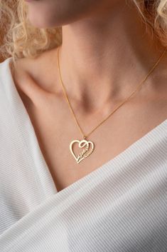 Express Your Love: Personalized Heart Name Necklace Share your affection with the Personalized Heart Name Necklace, meticulously crafted from 925 Sterling Silver. This charming necklace, weighing 2.30 grams, features a heart-shaped design where you can customize a special name, making it a heartfelt and unique accessory. 925 Sterling Silver is a premium metal known for its durability and brilliance, crafted by blending 92.5% pure silver with 7.5% copper for added strength and shine. This metal combination ensures long-lasting quality and beauty for your jewelry collection. Product Specifications: Metal Used: 925 Sterling Silver Plating Options: Gold, Rhodium, and Rose Plated Weight: 2.30 grams Figure Width: 3.00 cm Figure Length: 2.60 cm Chain Length: 42 cm + 3 cm extension Stone Type: Non Elegant Heart-shaped Name Necklace For Gift, Elegant Heart-shaped Name Necklace For Mom, Valentine's Day Name Necklace For Mom, Elegant Heart-shaped Name Necklace For Mother's Day, Heart Charm Name Necklace As Valentine's Gift For Mom, Heart Charm Name Necklace, Valentine's Day Gift For Mom, Heart Charm Name Necklace For Mom On Valentine's Day, Elegant Heart-shaped Name Necklace For Anniversary, Heart-shaped Name Necklace For Wedding